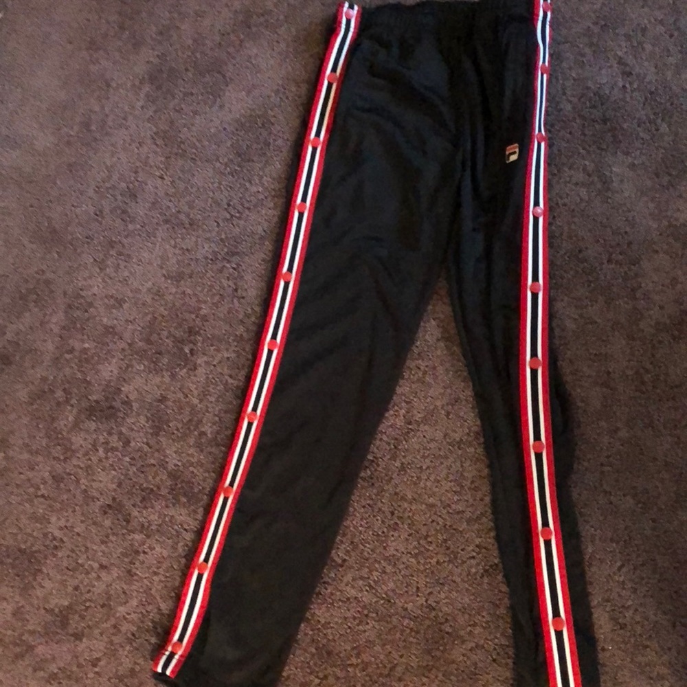 Black Fila pant with red and white button sides